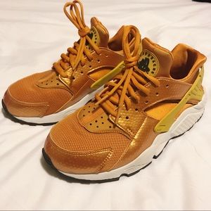 Orange / yellow Nike huarache sneakers
